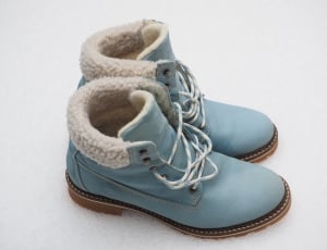 pair of blue leather winter boots thumbnail