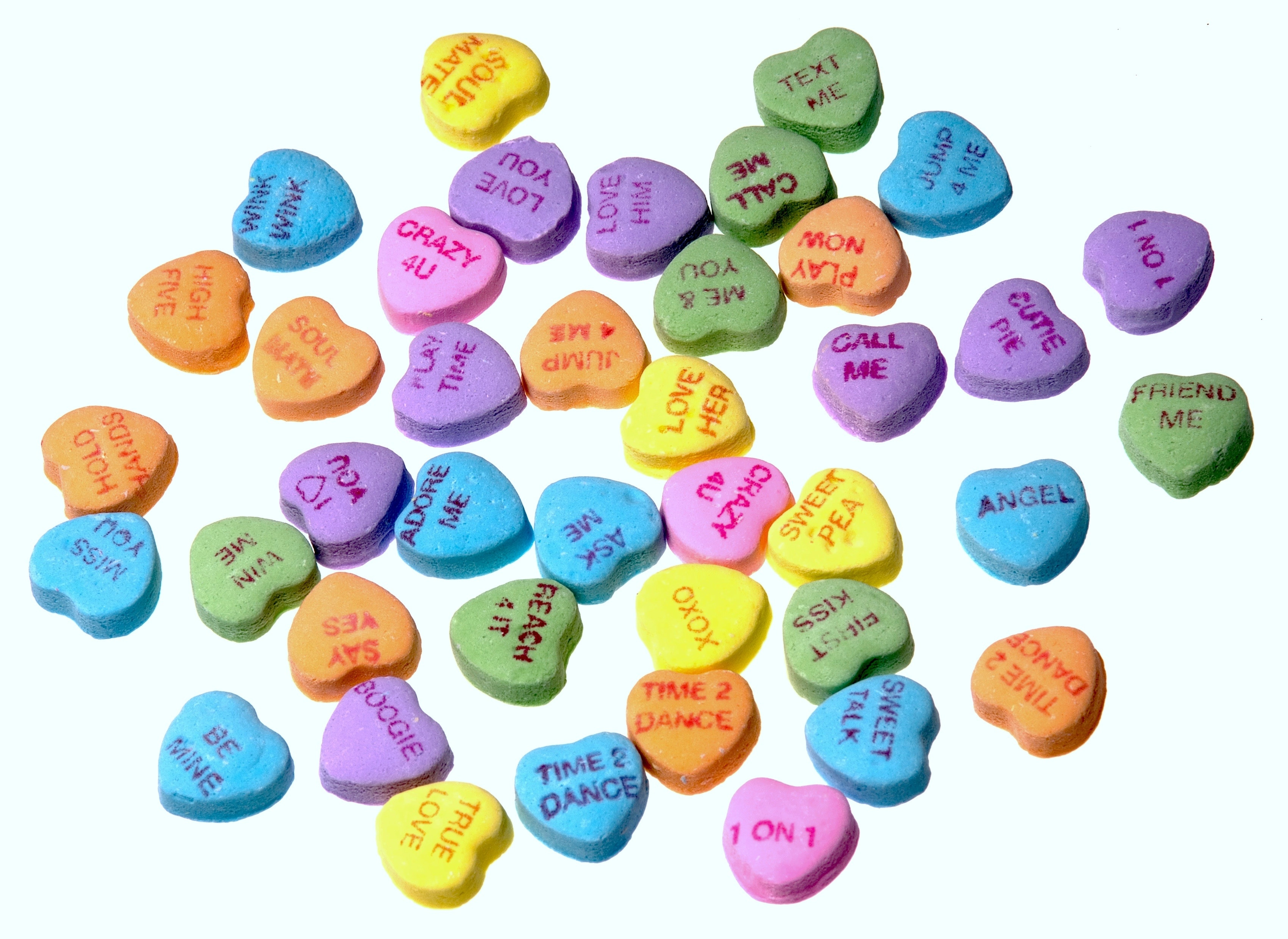 heart-shaped ornaments with text prints