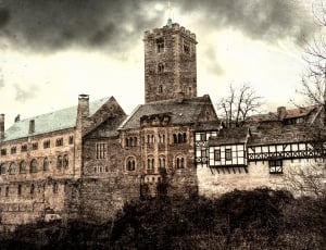 old castle photo under grey sky thumbnail