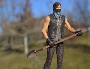 man action figure in close up photography thumbnail