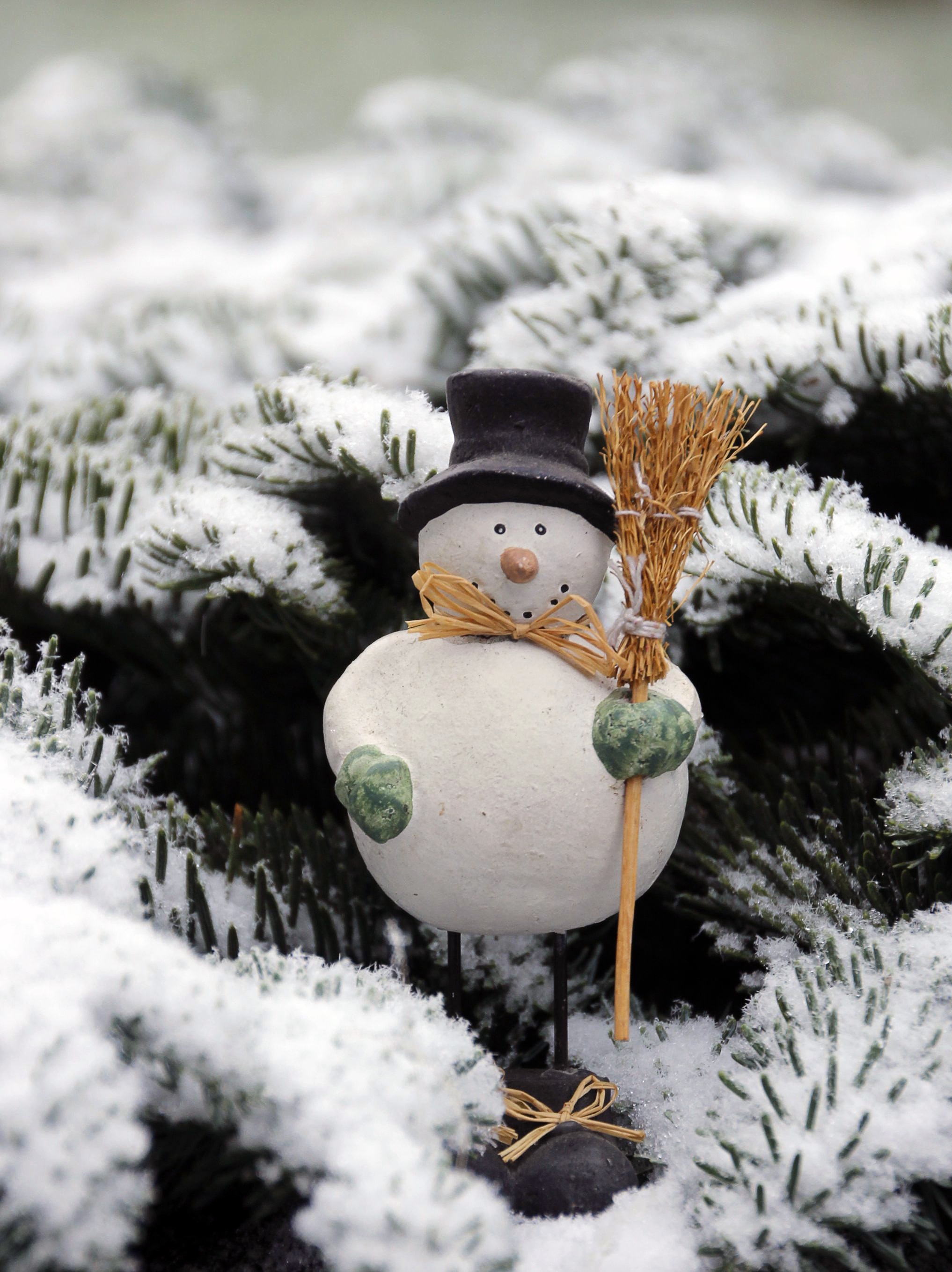 snowman holding broom ornament