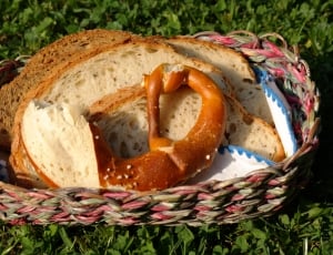 loaf bread and brown and pink woven basket thumbnail