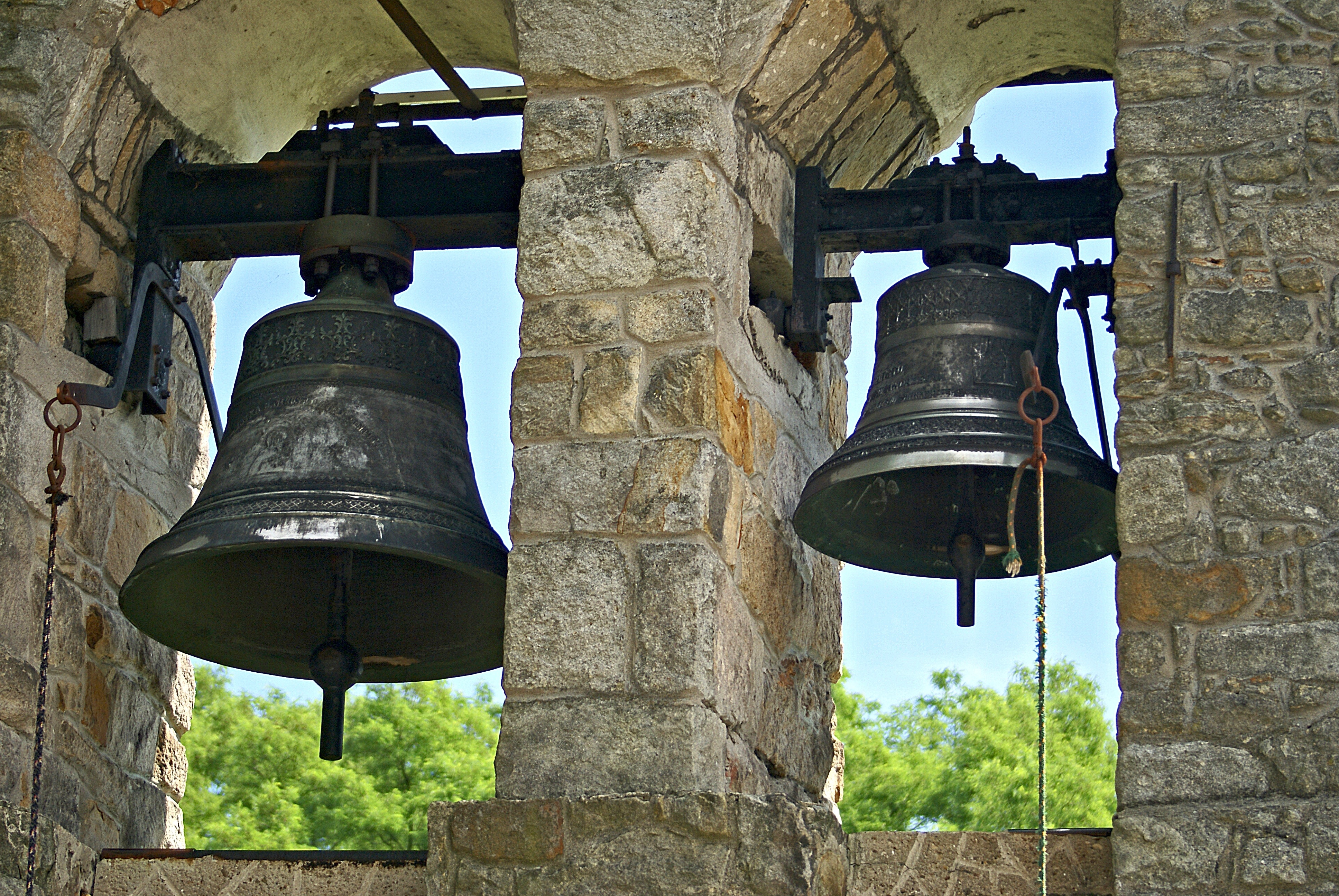 2 black steel bells