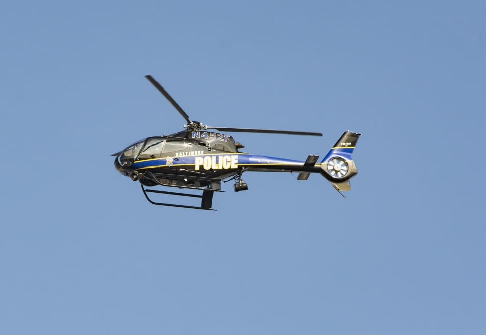 gray and blue police helicopter preview