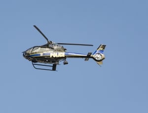 gray and blue police helicopter thumbnail