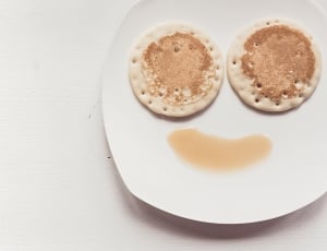 two pancakes in white ceramic plate thumbnail