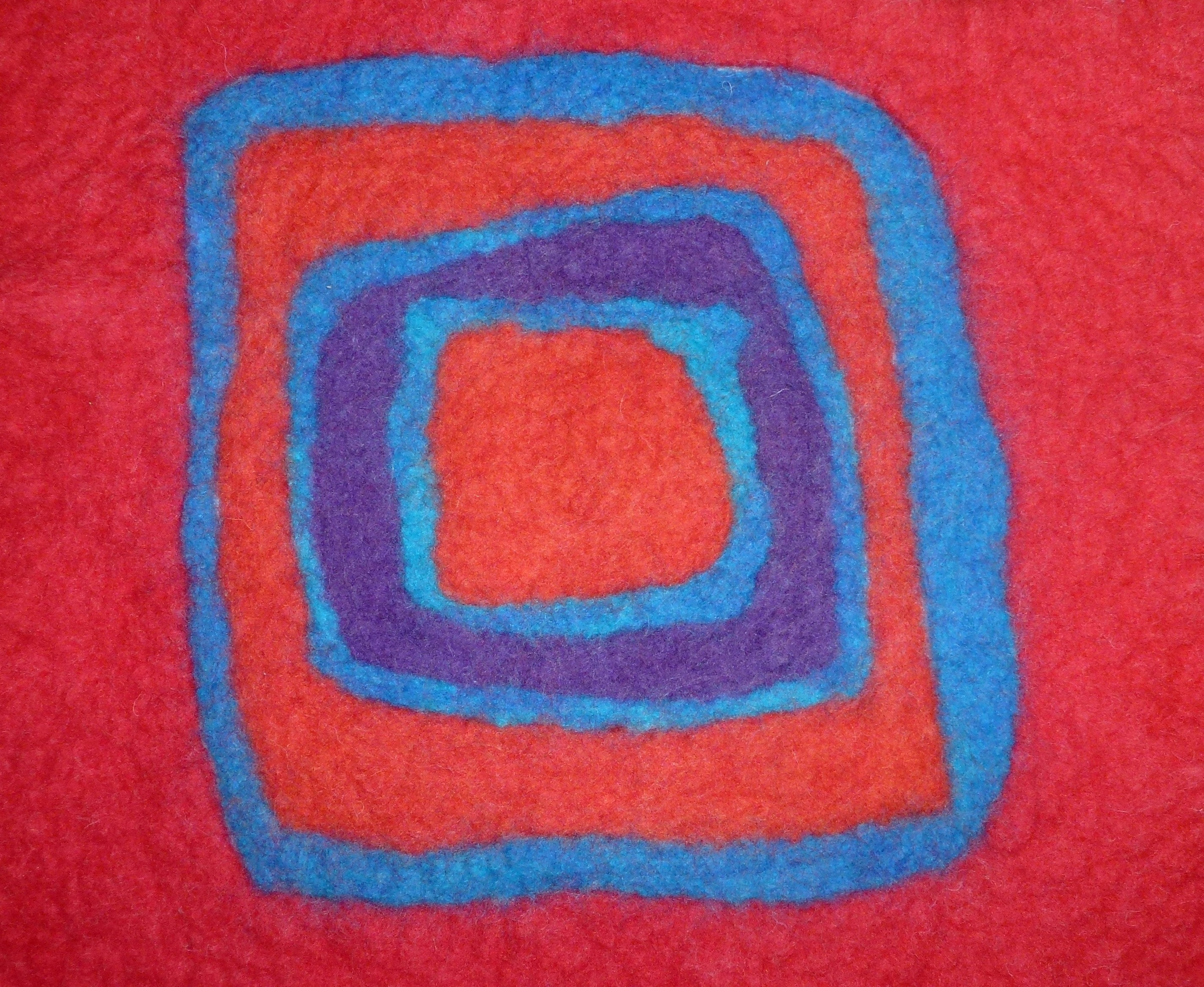 red blue and purple textile