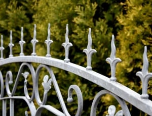 gray metal spiked frame security fence thumbnail