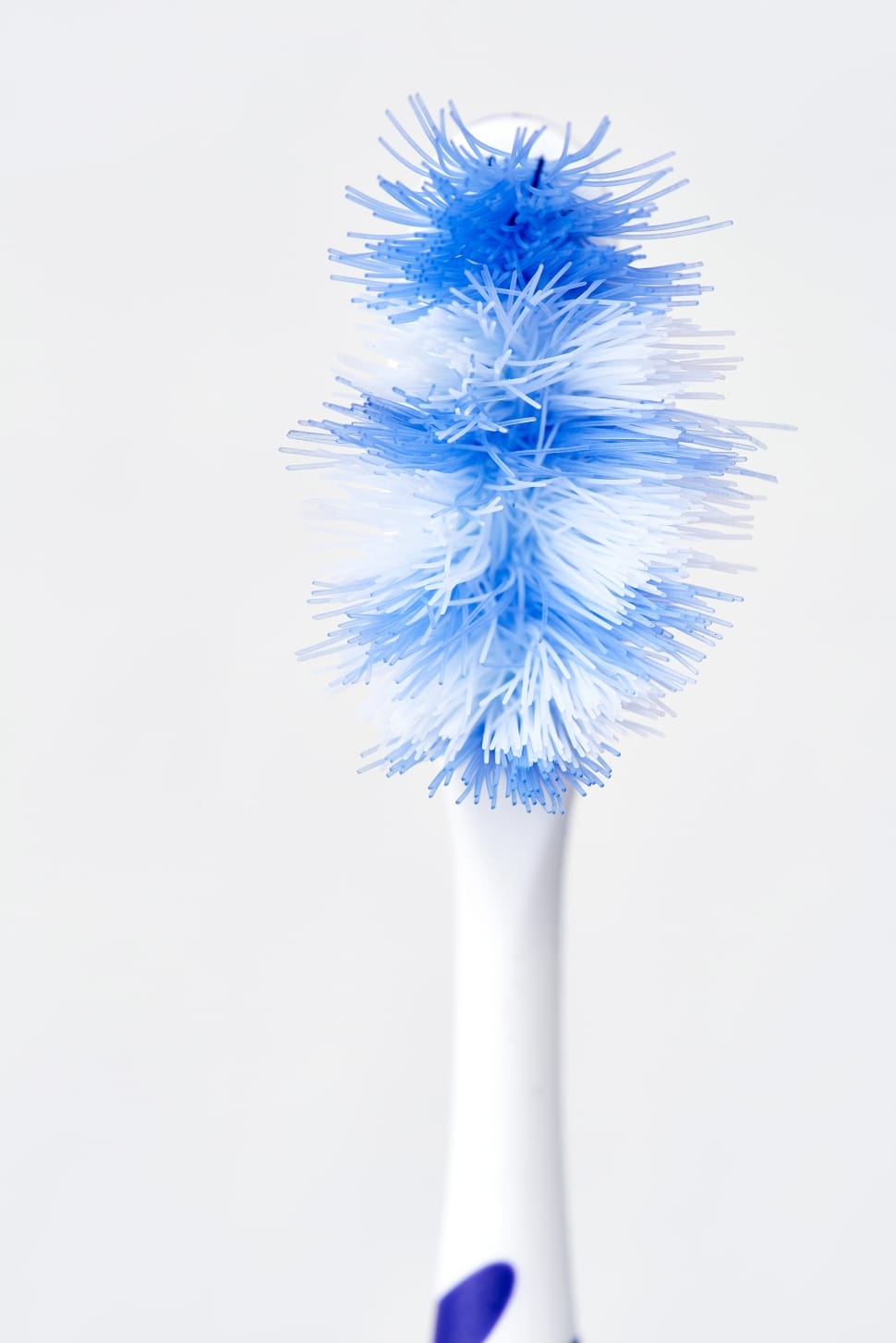 white and blue toothbrush preview
