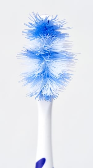 white and blue toothbrush thumbnail