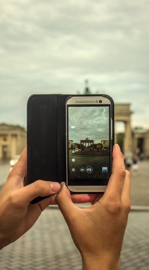 Person Taking Picture Using Gray Smartphone thumbnail