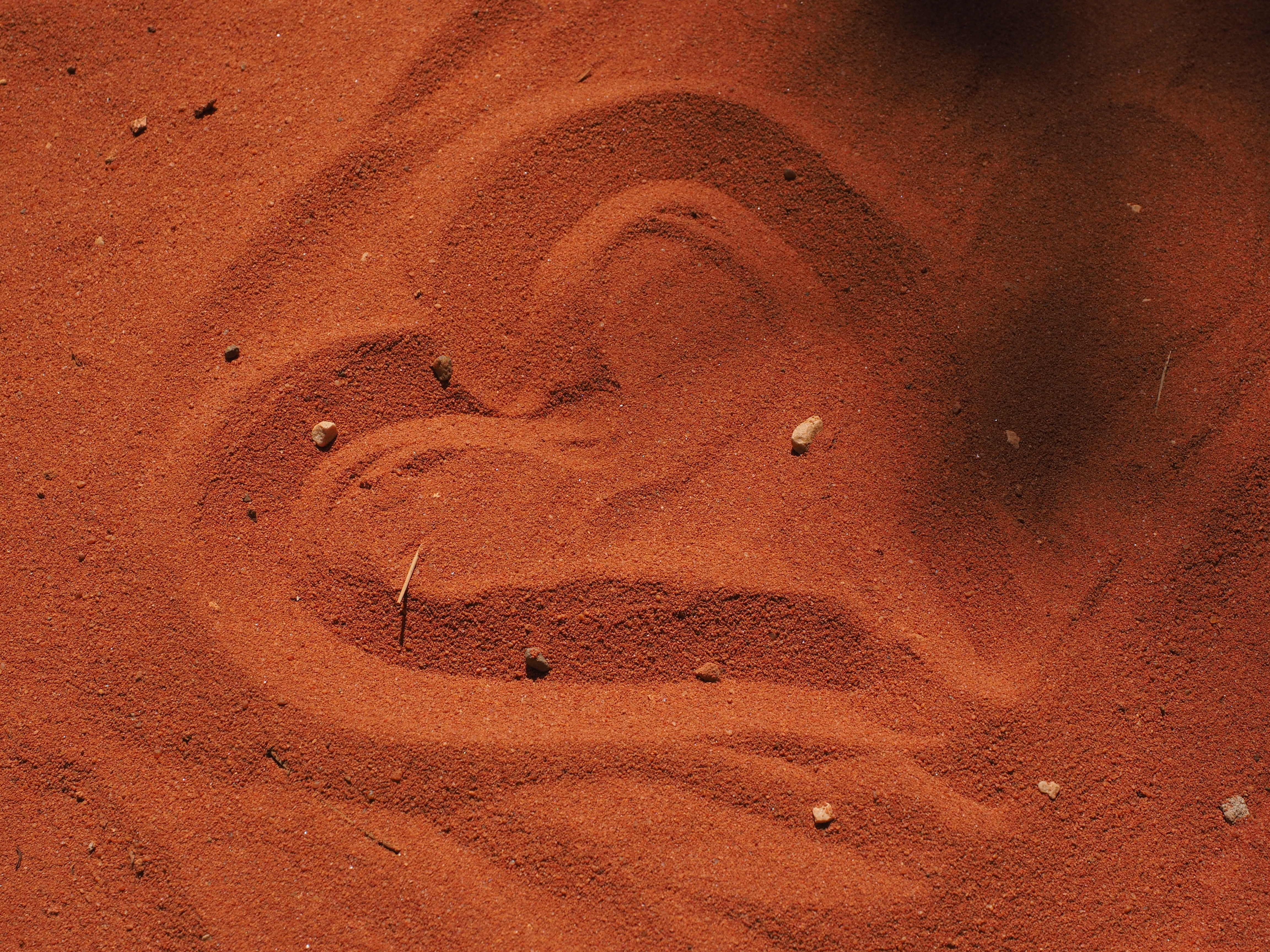 heart shaped sand artwork