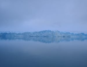 glacier on body of water thumbnail