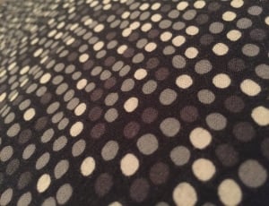white and black polka dot textile thumbnail