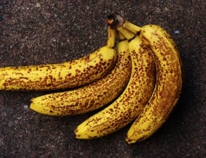 4 yellow and brown bananas thumbnail