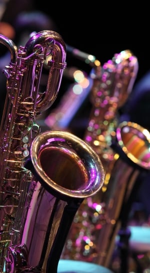 two brass saxophones thumbnail