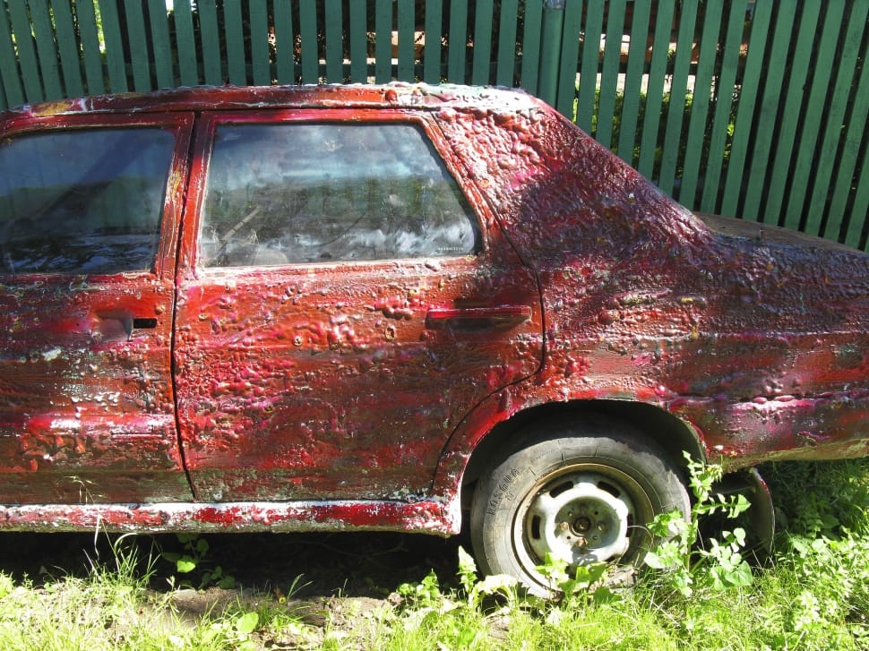 rusty red sedan preview