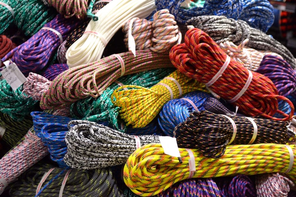 photo of rolled assorted colors of laces preview