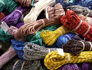 photo of rolled assorted colors of laces thumbnail