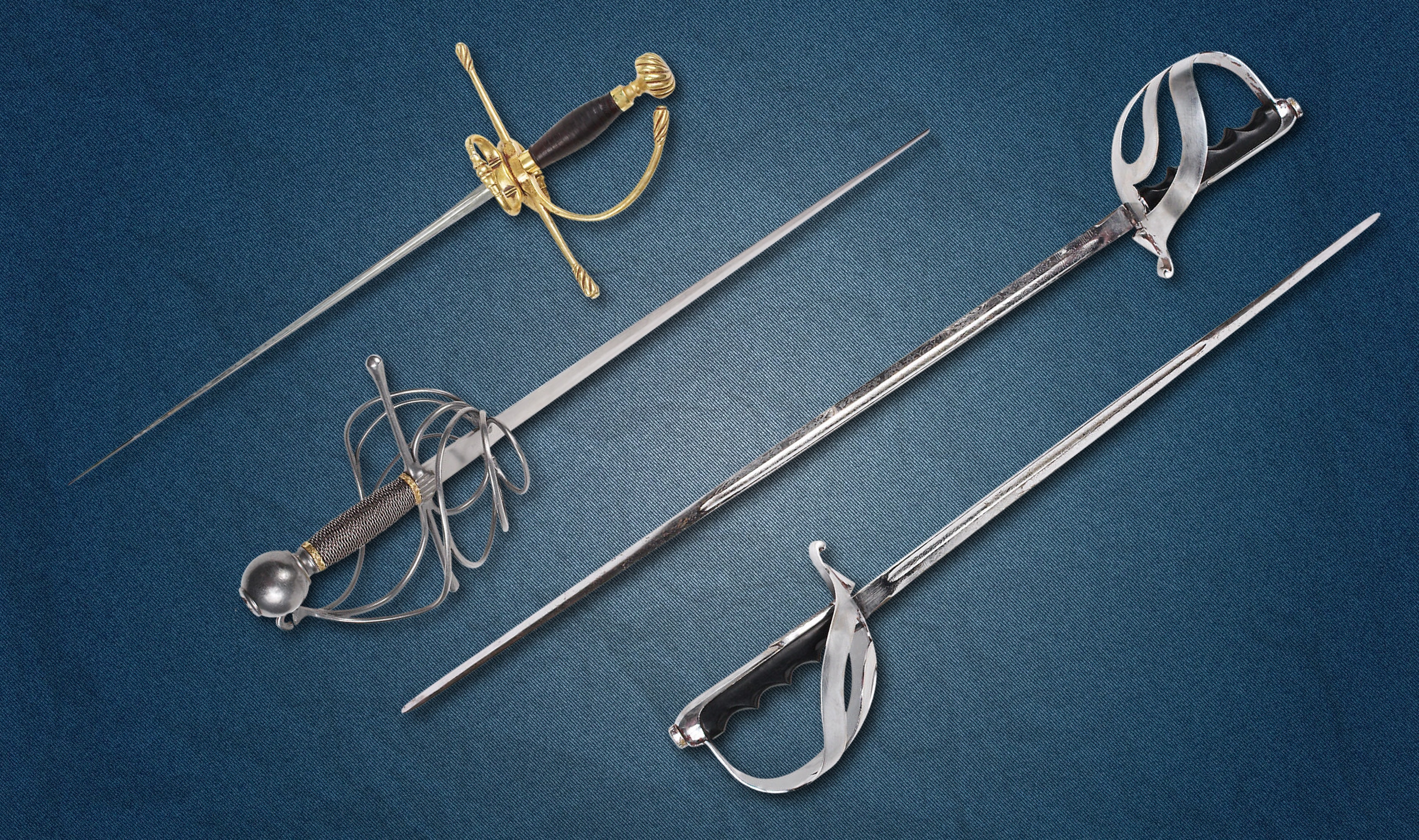 4 assorted sabres swords