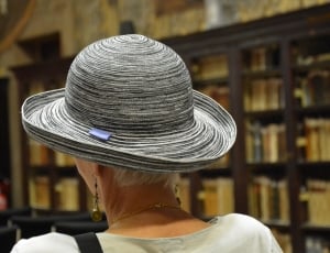 woman wearing gray fedora hat thumbnail