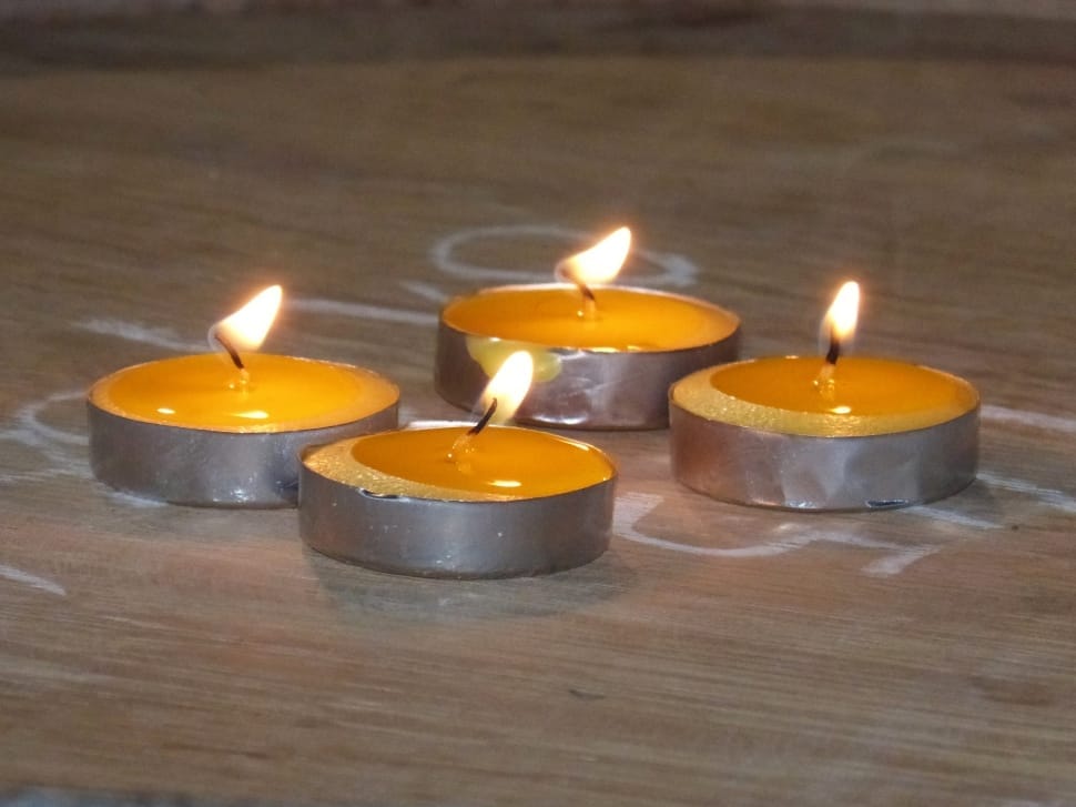 4 yellow tealight candles preview