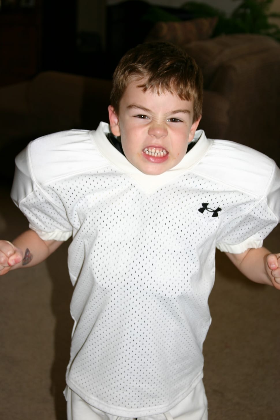 boy in white Under Armour shirt preview
