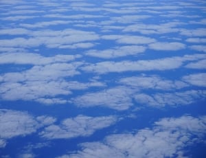 white and blue cloudy sky thumbnail