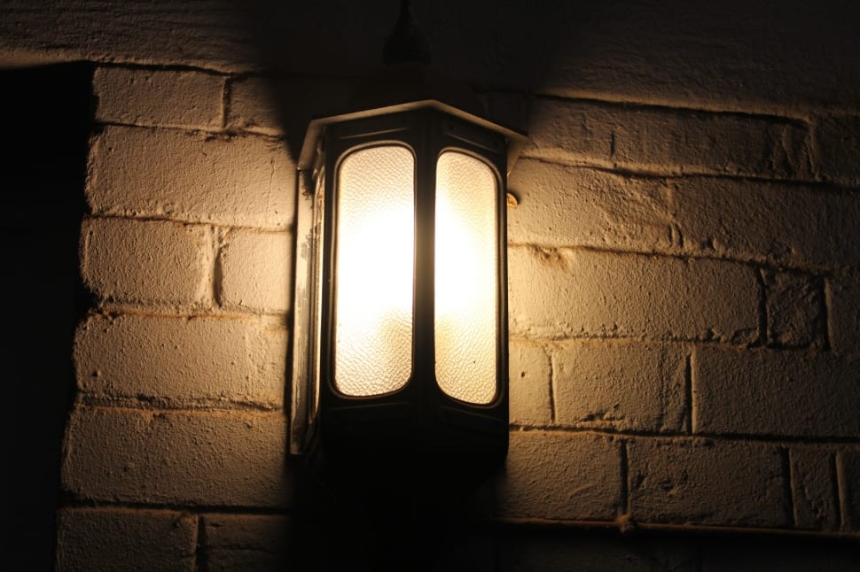 black steel framed wall mounted lamp on brick wall preview