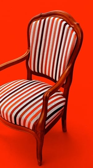 brown white and orange wooden armchair thumbnail