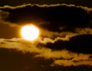 sun covered with clouds thumbnail
