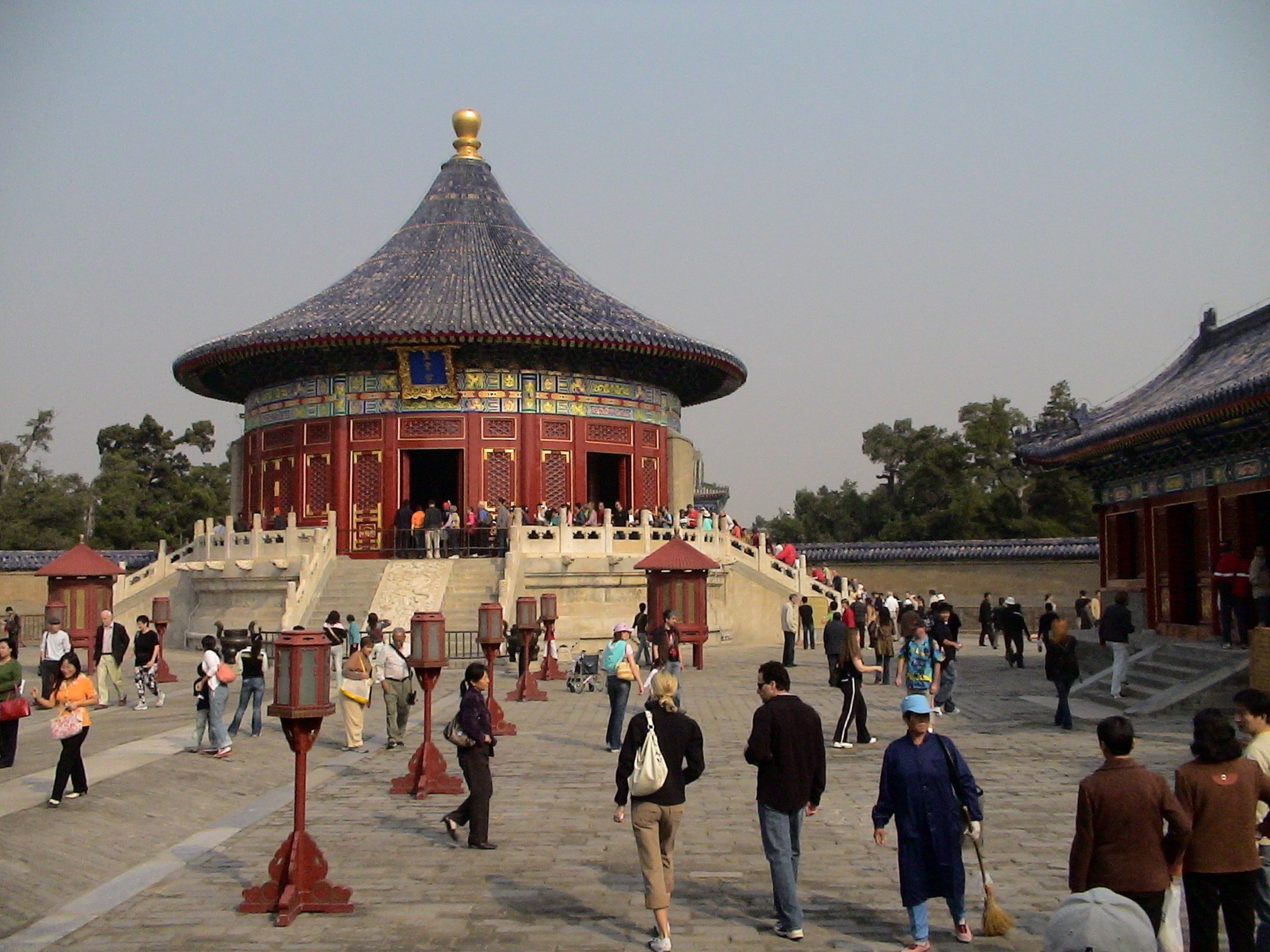 people walking towards brown and black temple during daytime
