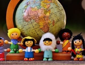 6 different countries dolls and desk globe thumbnail