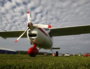 white and red airplane thumbnail