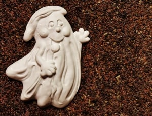white ceramic friendly ghost figurine thumbnail