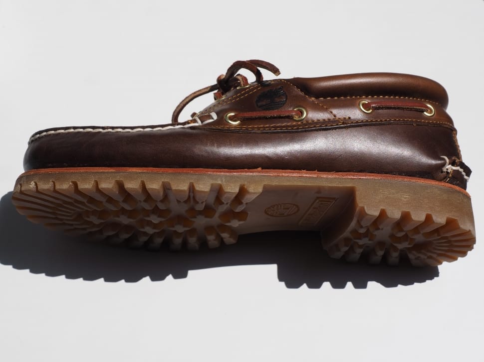 pair of brown leather boat shoes preview