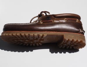 pair of brown leather boat shoes thumbnail