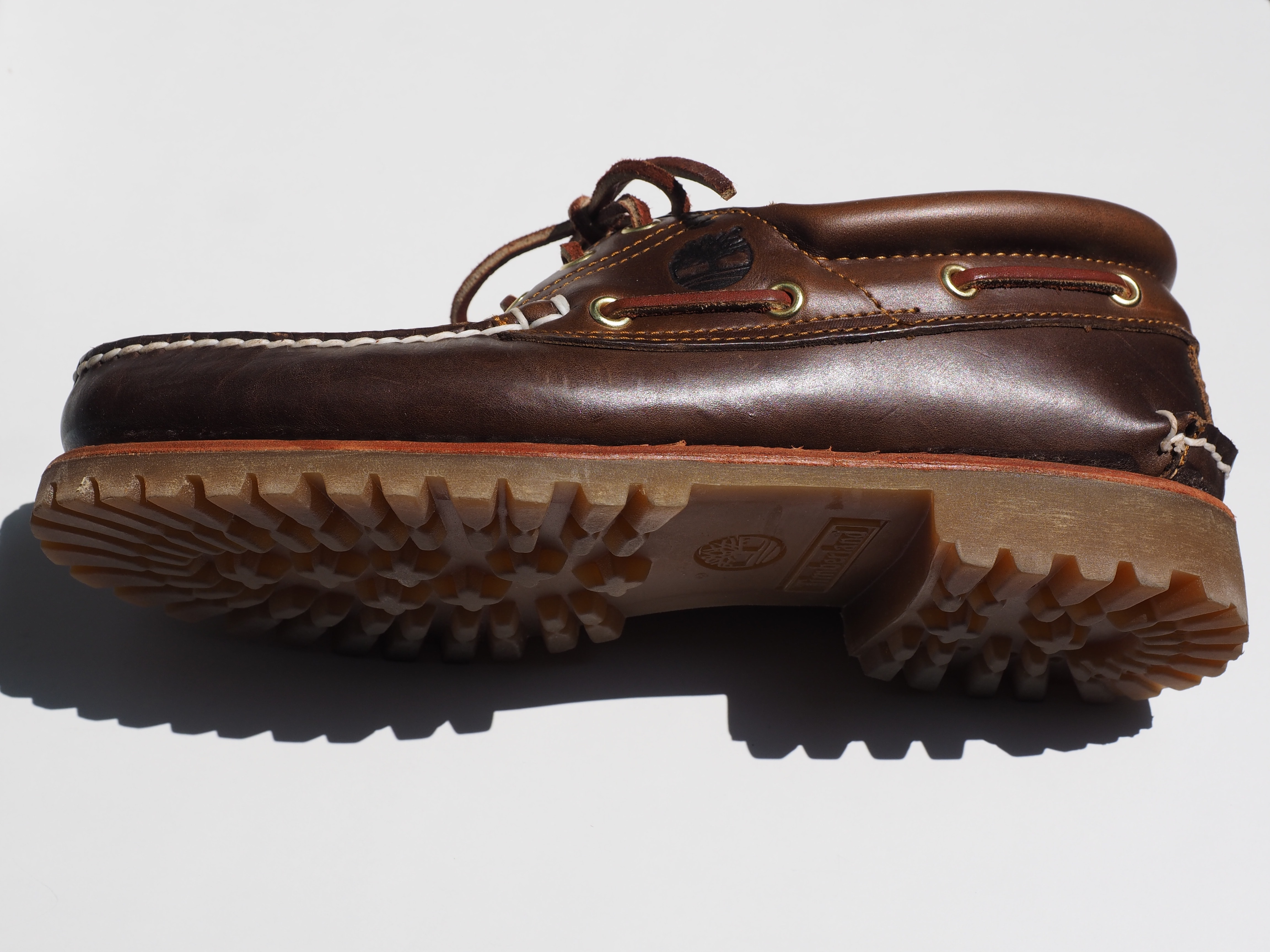 pair of brown leather boat shoes