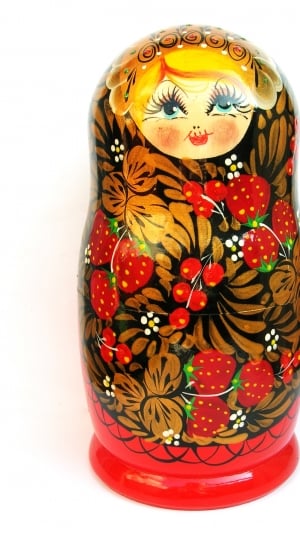 brown red and white matrioshca doll thumbnail