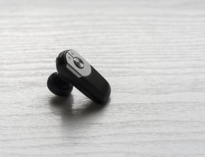 black and grey wireless earset thumbnail