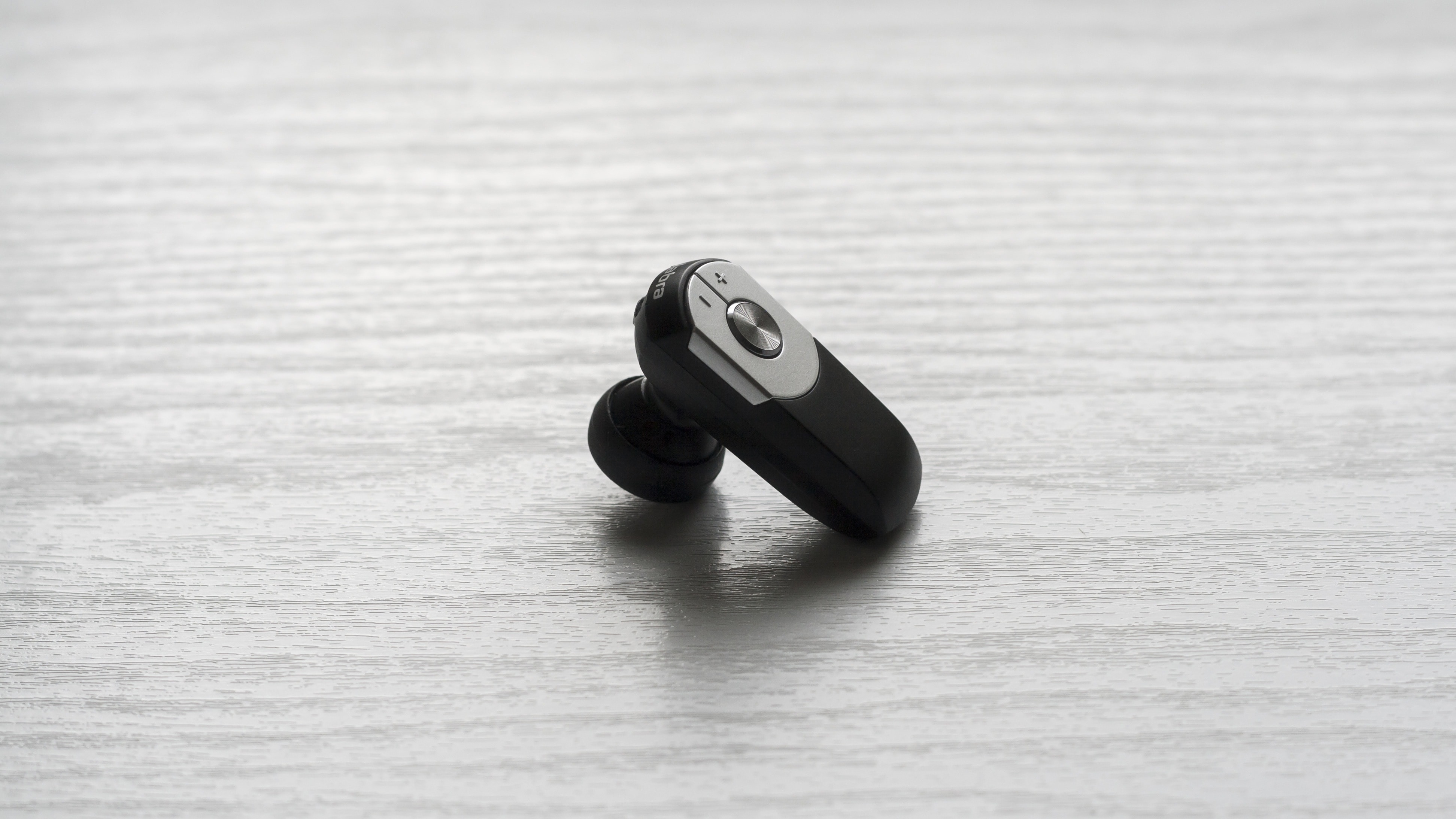black and grey wireless earset