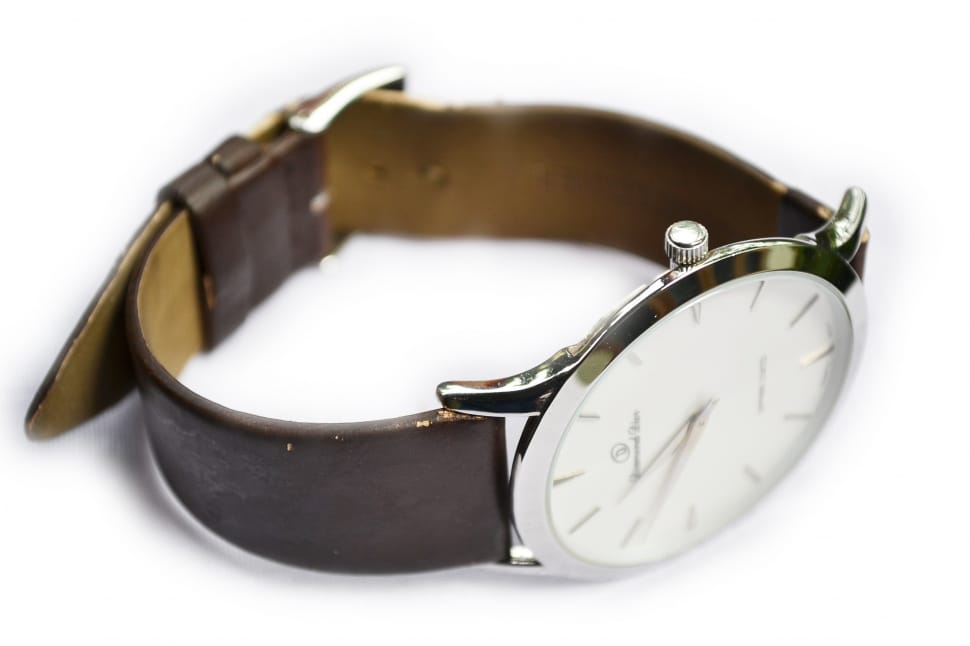 silver round analog brown leather strap watch preview