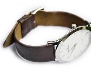 silver round analog brown leather strap watch thumbnail