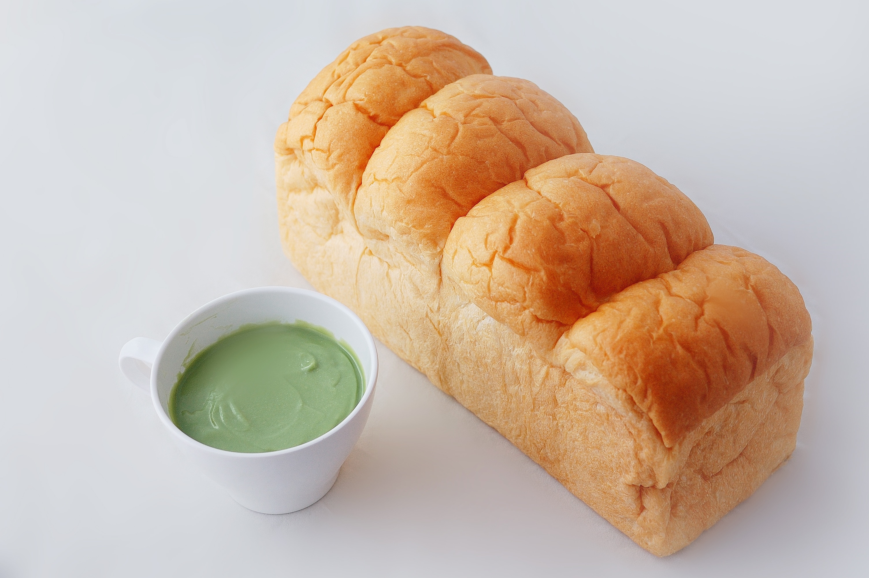 loaf bread and green sauce