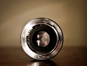 grey and black round lens thumbnail