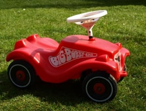red and white Big bobby Ghh ride on toy thumbnail
