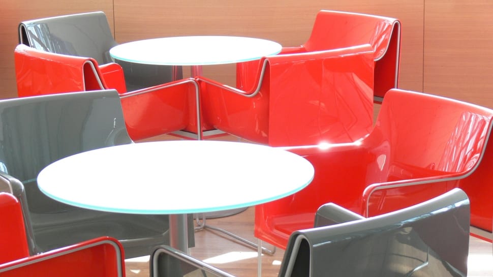 stainless steel base white table top and 4 red gray metal chairs preview