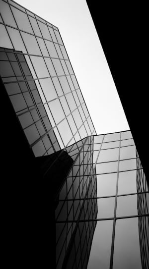 grayscale photography of mid rise building thumbnail