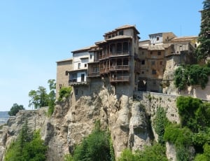 house on cliff during daytime thumbnail