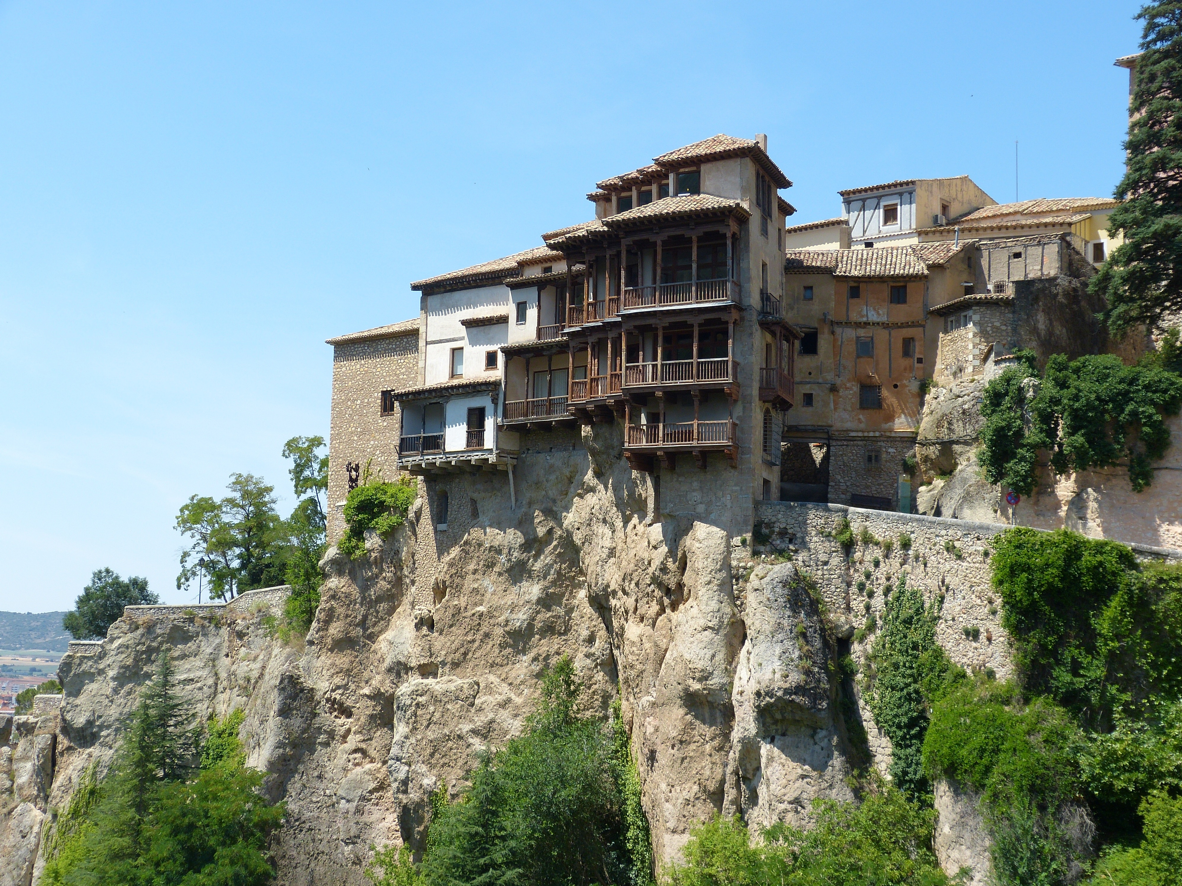 house on cliff during daytime